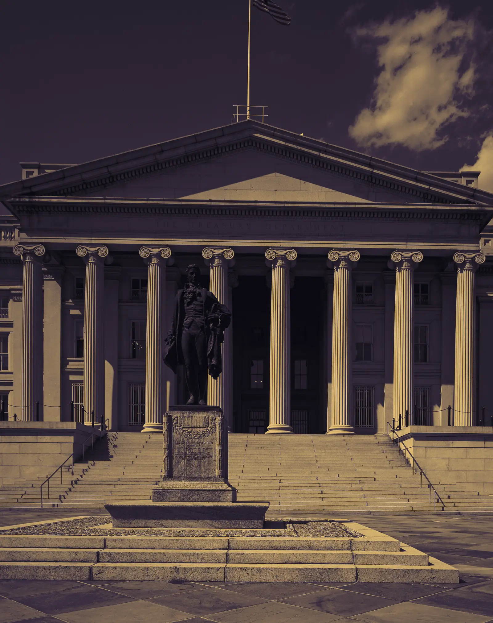 Statue of Alexander Hamilton in front of the Treasury Building