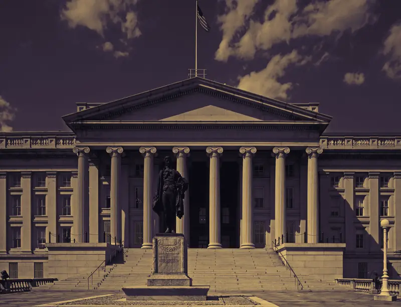 The U.S. Treasury Building in Washington, D.C., with the Alexander Hamilton statue in front